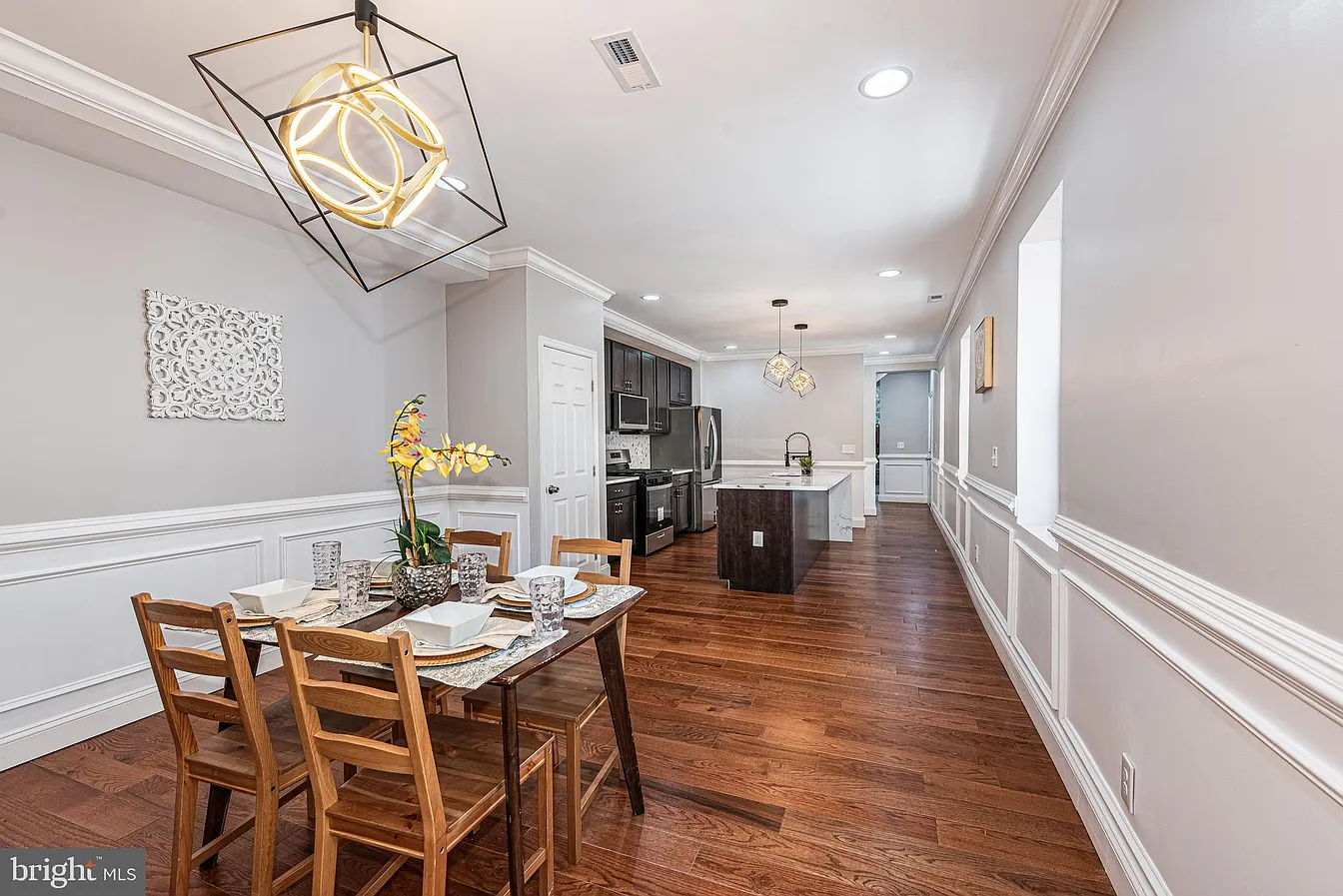 Harlem Park living room with slat accent wall and electric fireplace
