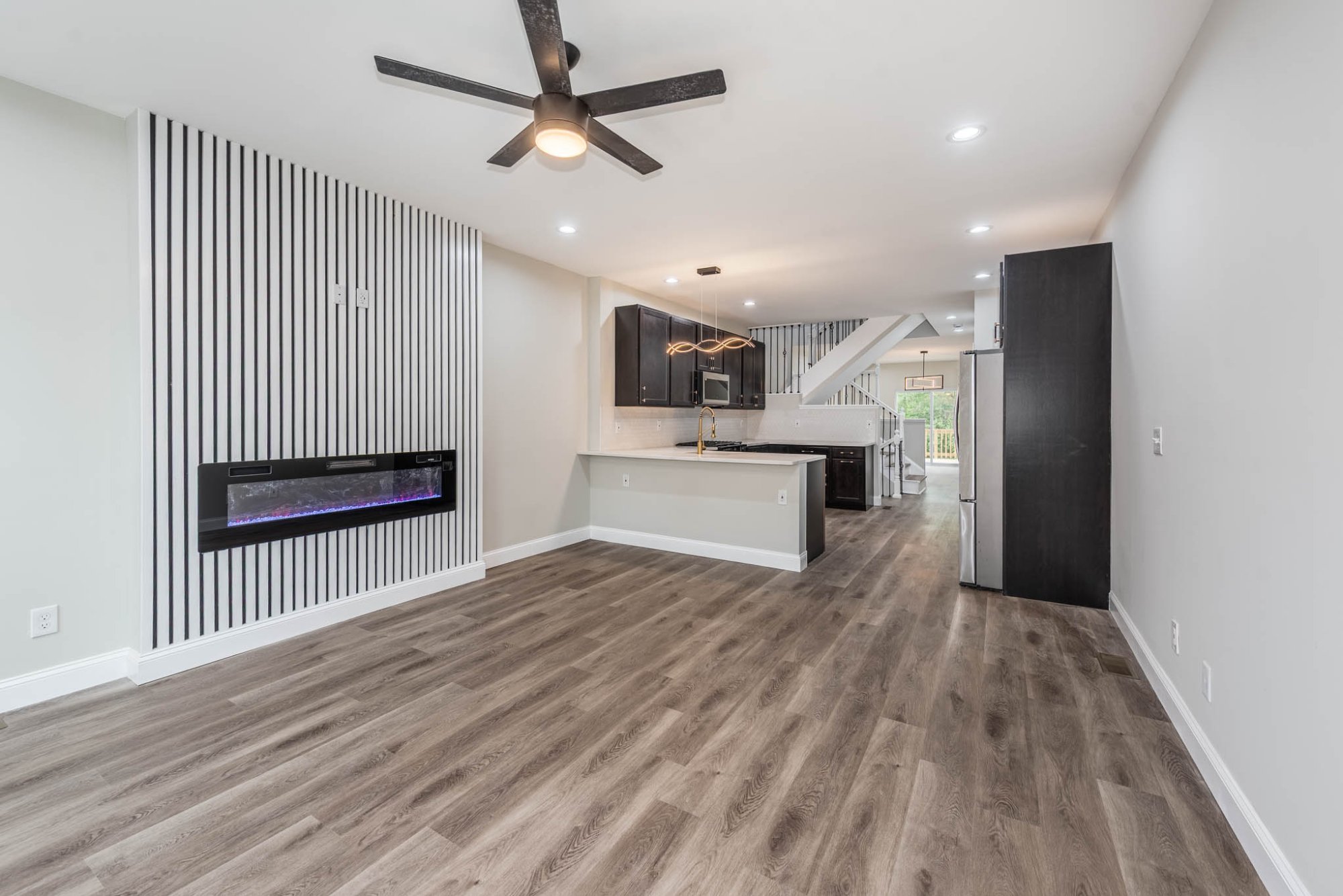 Hollins Market Modern new construction featuring open concept layout with espresso cabinetry and gold fixtures